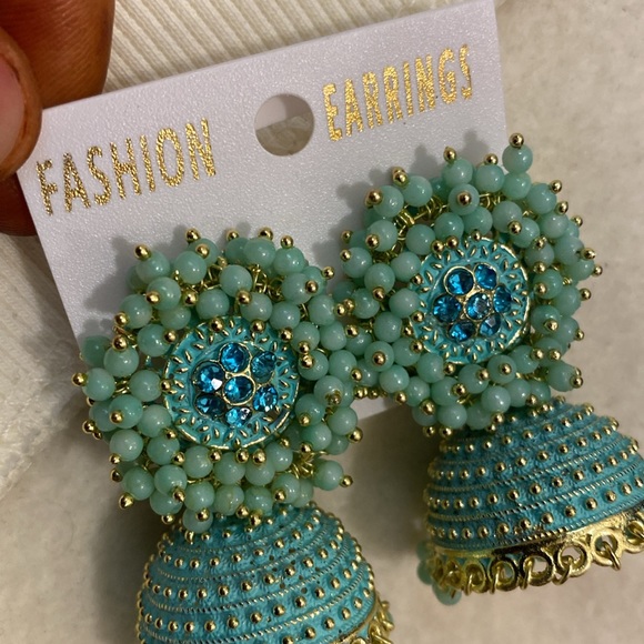"Elevate your style with these stunning mint color jhumka earrings! - Picture 3 of 3
